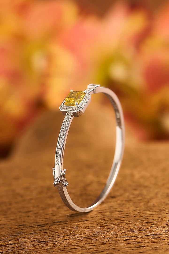 White Finish Eurostar Zircon & Yellow Sapphire Stone Openable Bracelet In Sterling Silver by STELLA CREATIONS at Pernia's Pop Up Shop