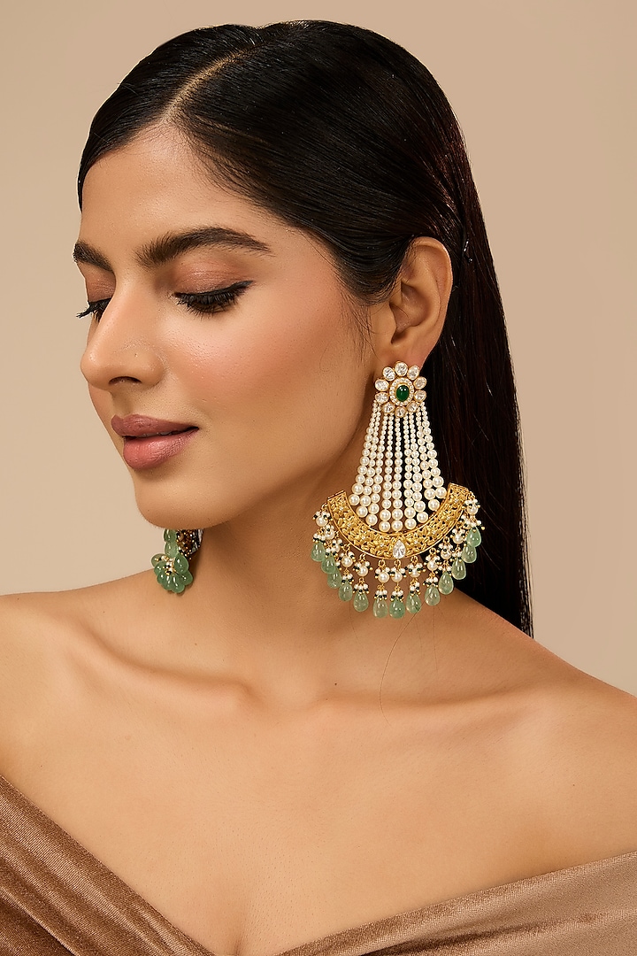 Yellow Gold Finish Moissanite Polki & Glass-Filled Emerald Chandbali Earrings In Sterling Silver by STELLA CREATIONS at Pernia's Pop Up Shop