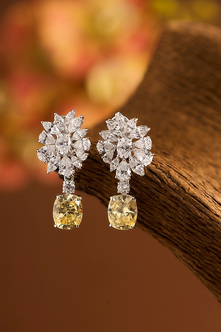 White Gold Finish Eurostar Zircon & Glass-Filled Yellow Sapphire Dangler Earrings In Sterling Silver by STELLA CREATIONS at Pernia's Pop Up Shop