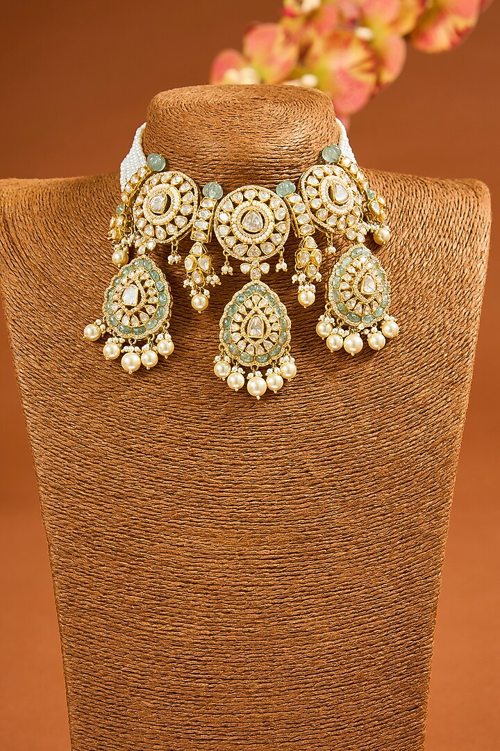 Yellow Gold Finish Moissanite Polki & Emerald Choker Necklace Set In Sterling Silver by STELLA CREATIONS at Pernia's Pop Up Shop