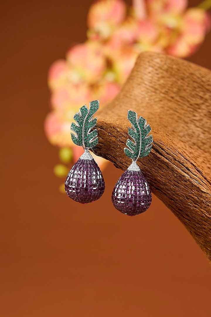 White Gold Finish Eurostar Zircon & Glass-Filled Emerald Dangler Earrings In Sterling Silver by STELLA CREATIONS at Pernia's Pop Up Shop