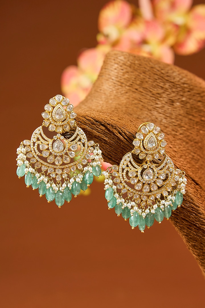Yellow Gold Finish Moissanite Polki & Emerald Dangler Earrings In Sterling Silver by STELLA CREATIONS at Pernia's Pop Up Shop