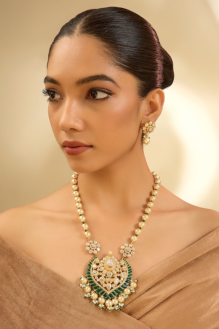 Yellow Gold Finish Moissanite Polki & Emerald Long Necklace In Sterling Silver by STELLA CREATIONS at Pernia's Pop Up Shop