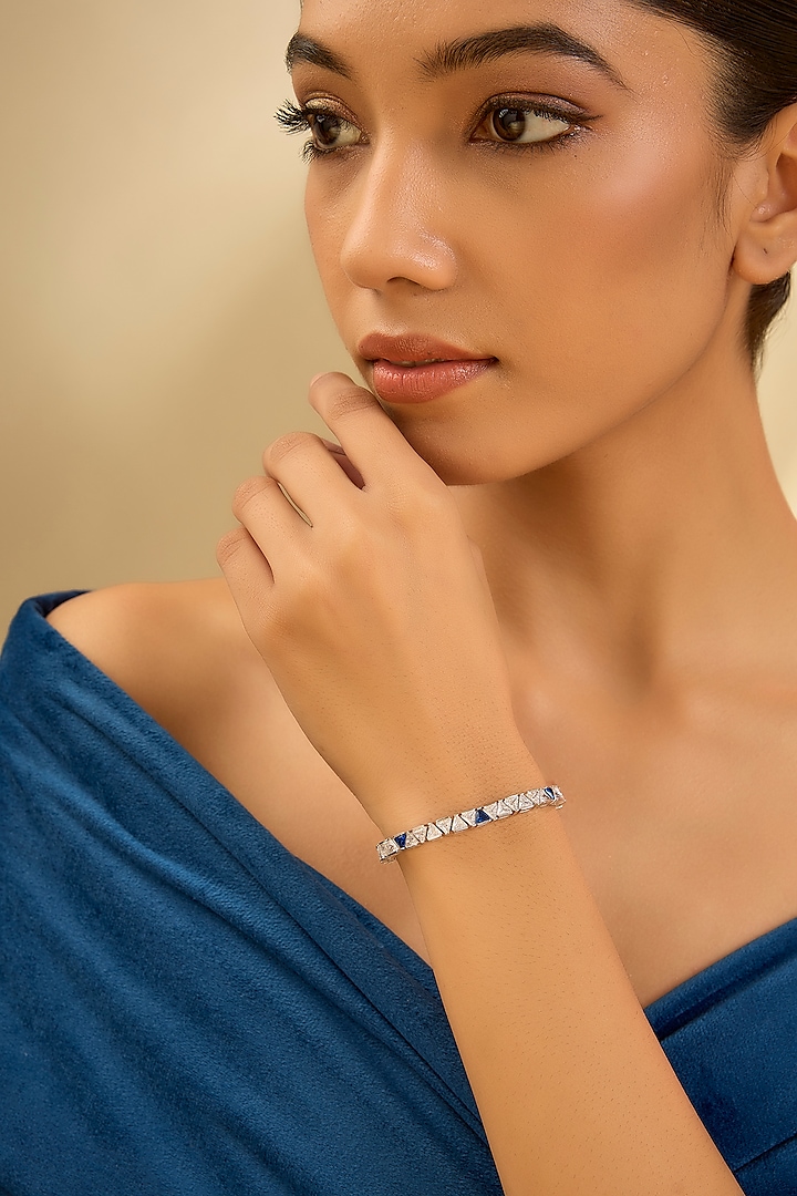 White Gold Finish Eurostar Zircon & Glass-Filled Blue Sapphire Bracelet In Sterling Silver by STELLA CREATIONS at Pernia's Pop Up Shop