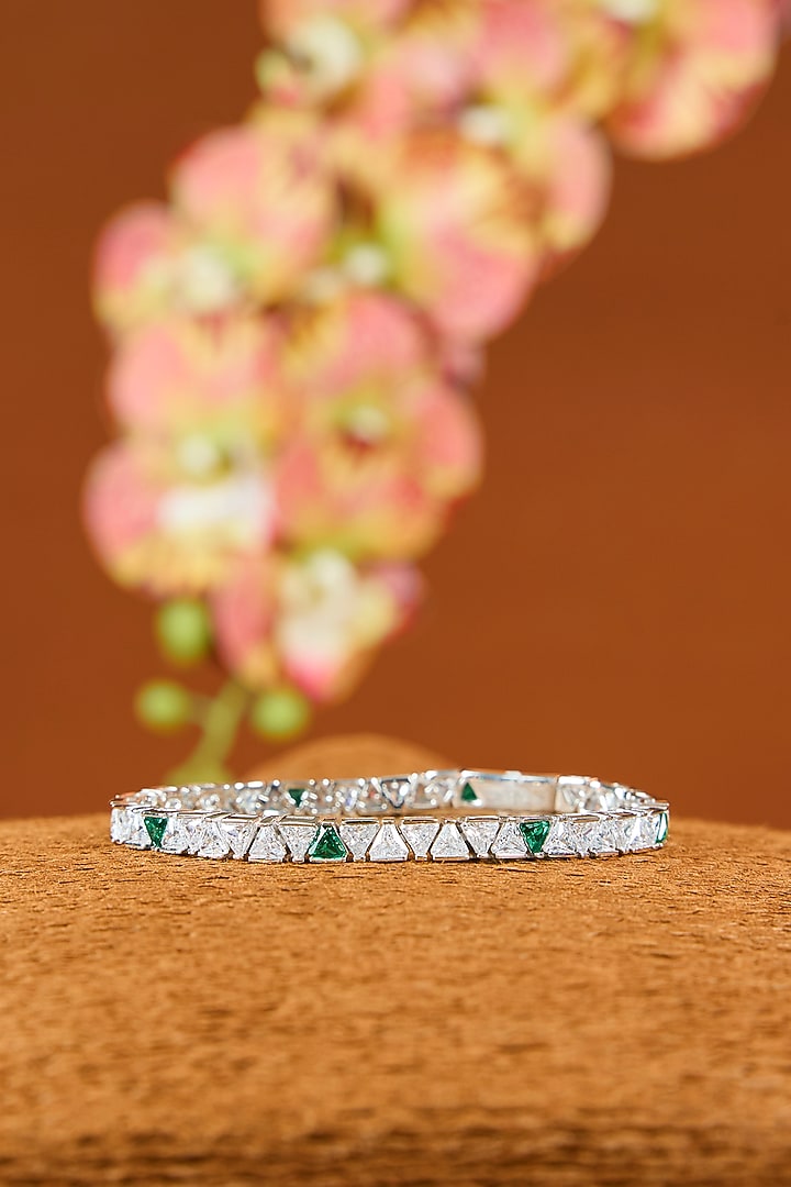 White Gold Finish Eurostar Zircon & Emerald Bracelet In Sterling Silver by STELLA CREATIONS at Pernia's Pop Up Shop