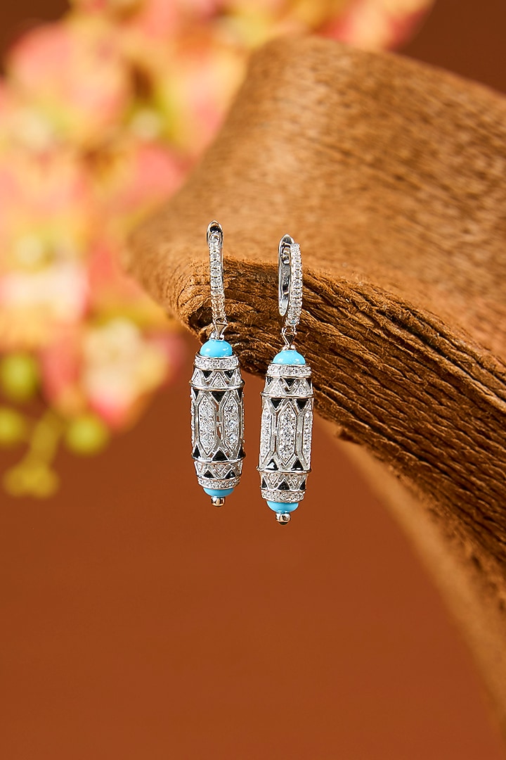 White Gold Finish Eurostar Zircon Enameled Dangler Earrings In Sterling Silver by STELLA CREATIONS at Pernia's Pop Up Shop