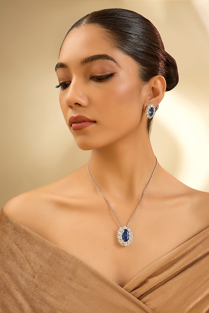 White Gold Finish Eurostar Zircon & Sapphire Pendant Set In Sterling Silver by STELLA CREATIONS at Pernia's Pop Up Shop