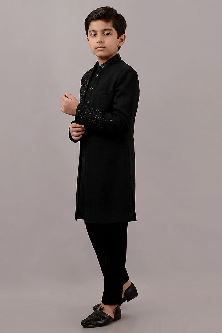 Black Textured Suiting Hand Embroidered Indowestern Set For Boys by STEEL kids at Pernia's Pop Up Shop