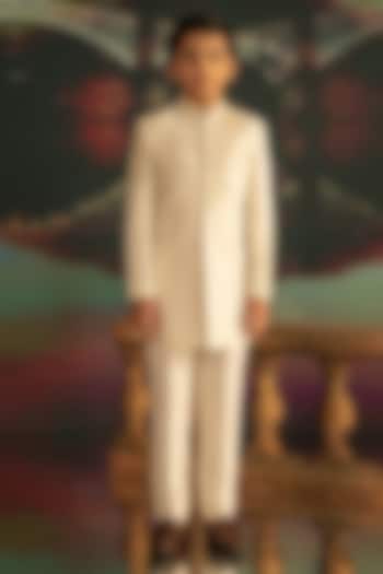 Cream Textured Suiting Hand Embroidered Indowestern Set For Boys by STEEL kids at Pernia's Pop Up Shop
