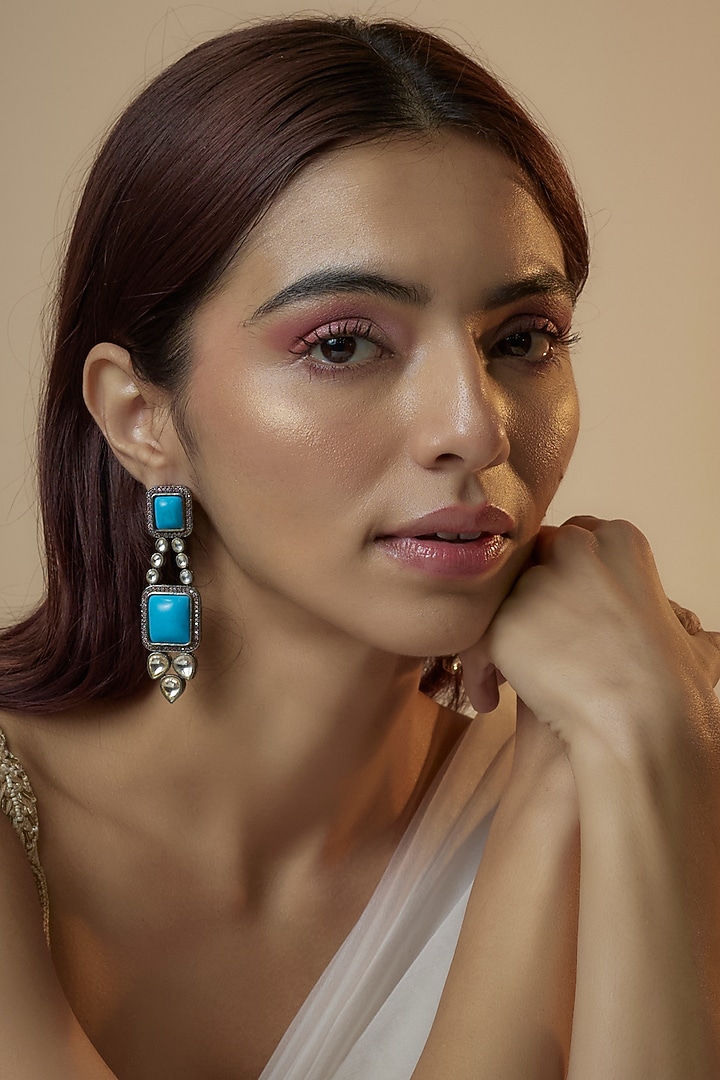 Black Rhodium Finish Zircon & Blue Stone Dangler Earrings by Studio6 Jewels at Pernia's Pop Up Shop