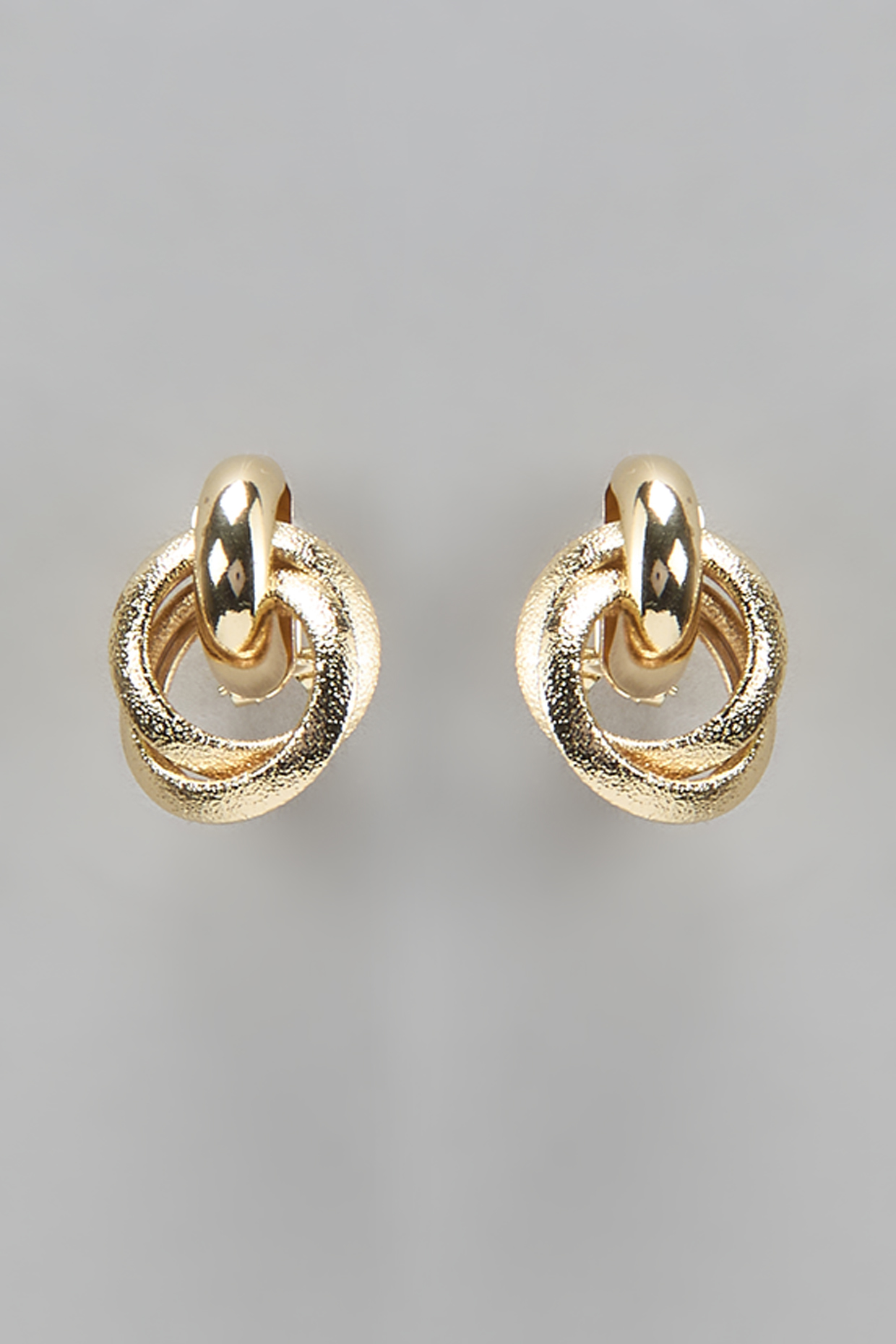 Gold Finish Interloop Stud Earrings by Studio6 Jewels at Pernia's Pop Up Shop