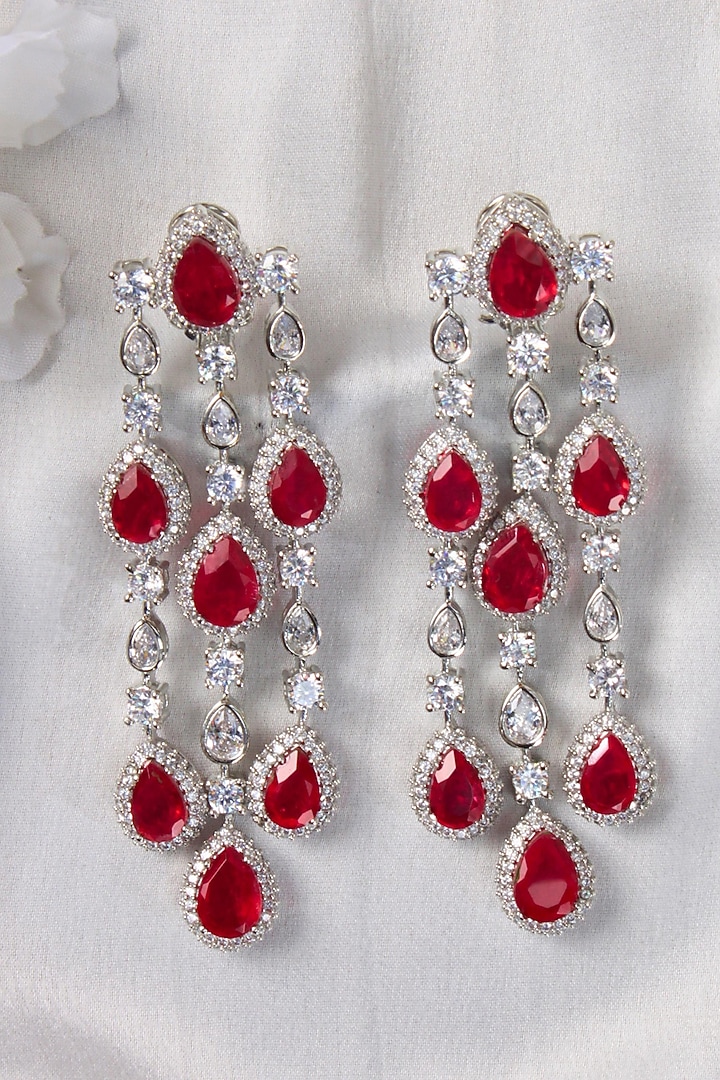 White Finish Red Stone & Zircon Dangler Earrings by Studio6 Jewels at Pernia's Pop Up Shop