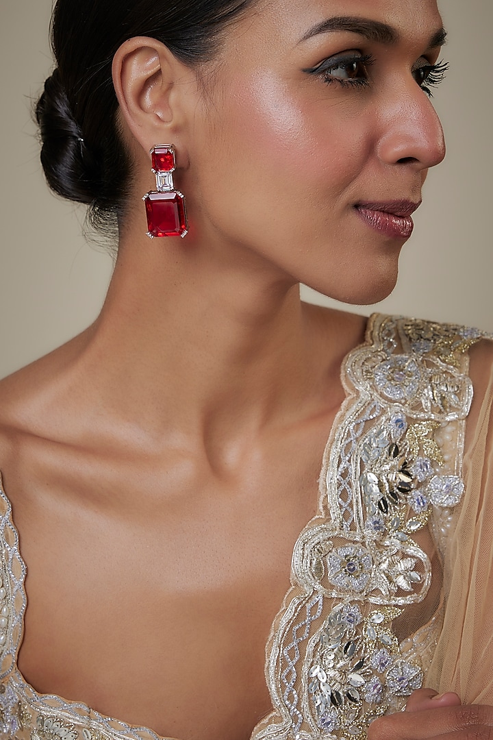 White Finish Zircon & Red Stone Dangler Earrings by Studio6 Jewels at Pernia's Pop Up Shop