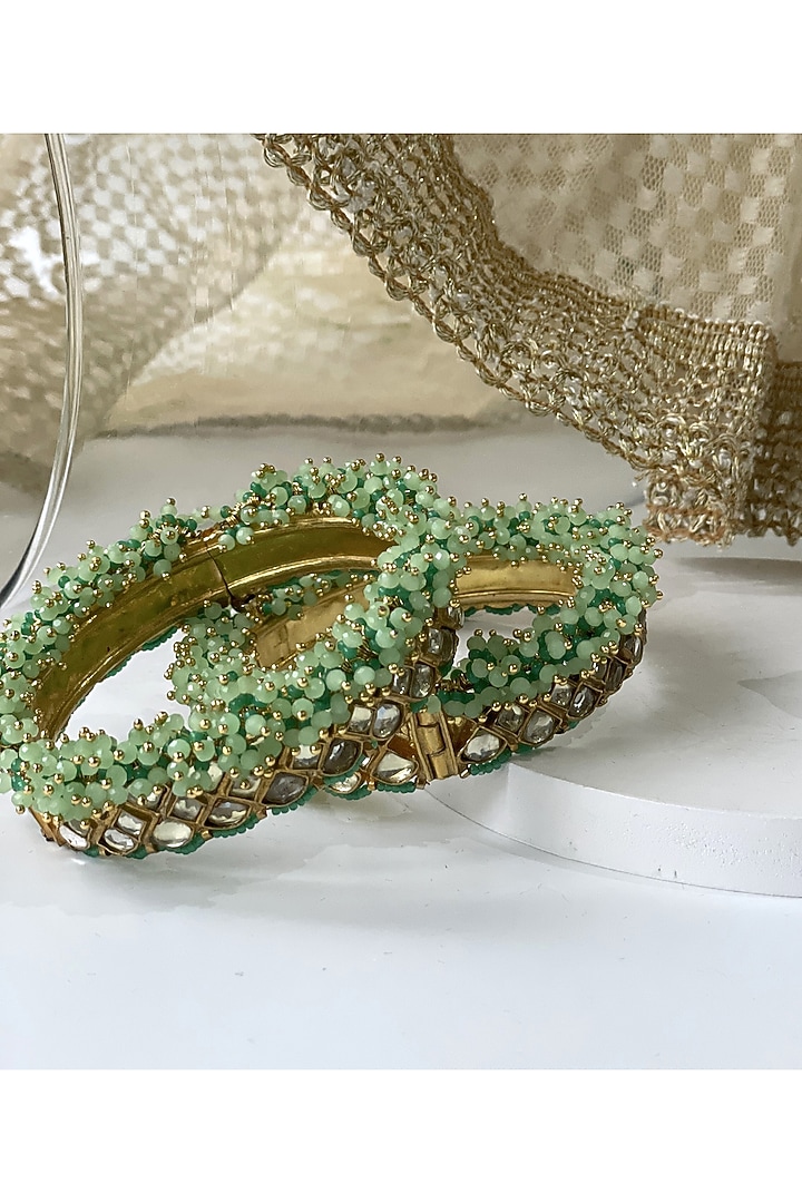 Gold Finish Kundan Polki & Mint Green Beaded Kadas (Set of 2) by Studio6 Jewels at Pernia's Pop Up Shop