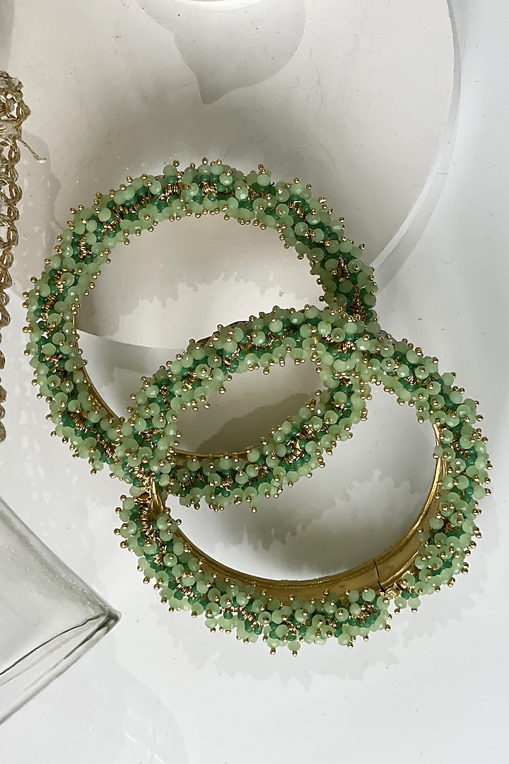 Gold Finish Kundan Polki & Mint Green Beaded Kadas (Set of 2) by Studio6 Jewels at Pernia's Pop Up Shop