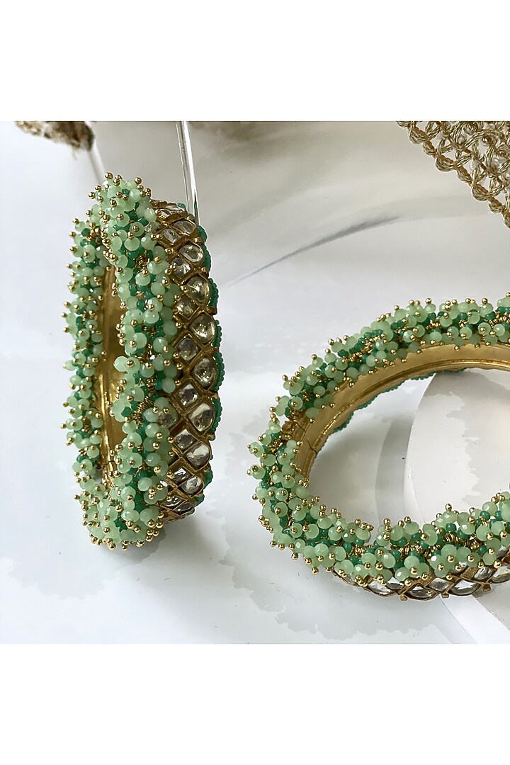 Gold Finish Kundan Polki & Mint Green Beaded Kadas (Set of 2) by Studio6 Jewels at Pernia's Pop Up Shop