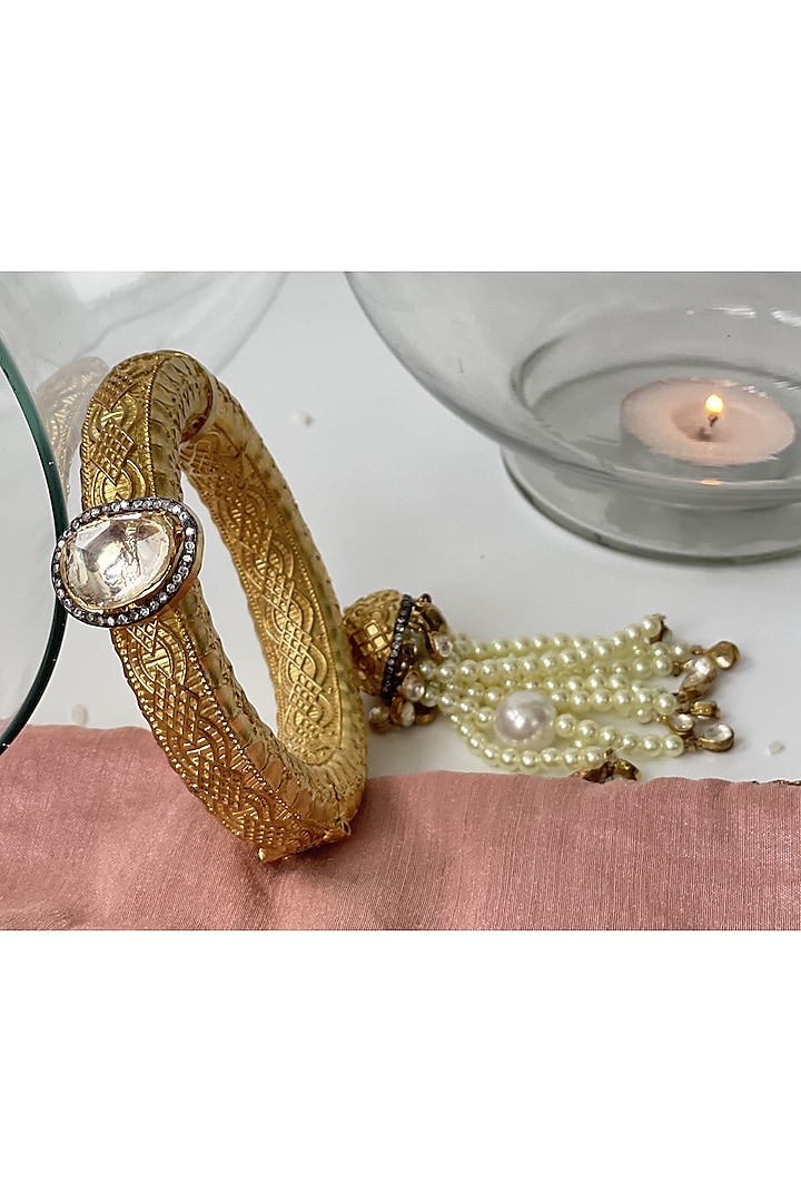 Gold Finish Kundan Polki & Pearl Tassel Openable Bangle by Studio6 Jewels at Pernia's Pop Up Shop