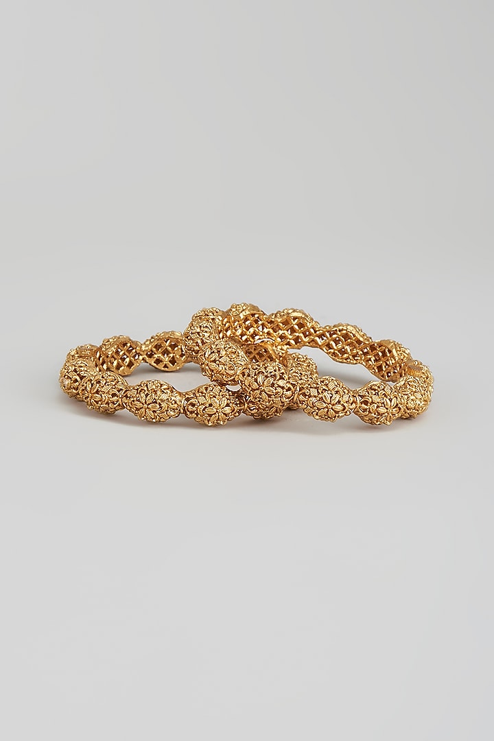 Gold Finish Carved Temple Bangles (Set of 2) by Studio6 Jewels at Pernia's Pop Up Shop