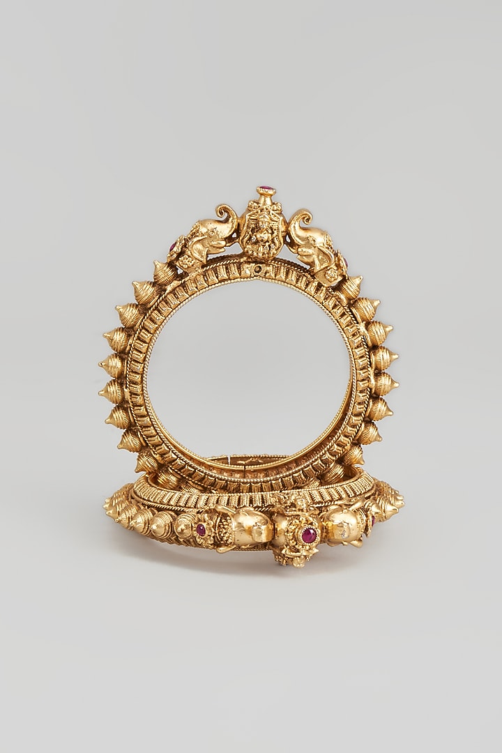 Gold Finish Motif Temple Bangles (Set of 2) by Studio6 Jewels at Pernia's Pop Up Shop