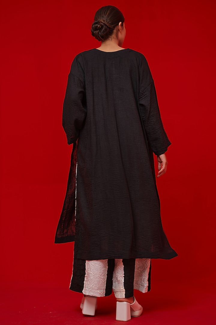 Black & Yellow Linen Silk Applique Work Tunic by STOIQUE at Pernia's Pop Up Shop