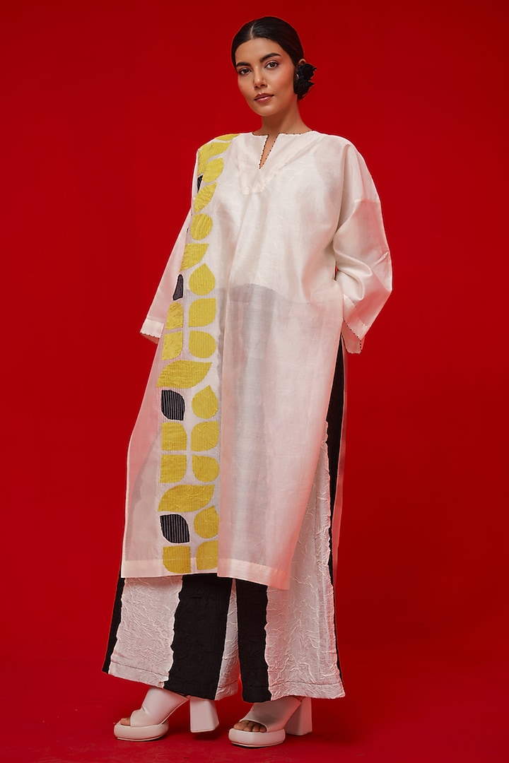 Ivory & Yellow Silk Chanderi Applique Motif Tunic by STOIQUE at Pernia's Pop Up Shop