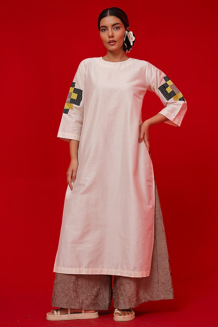 Ivory & Black Silk Cotton Floral Applique Tunic by STOIQUE at Pernia's Pop Up Shop
