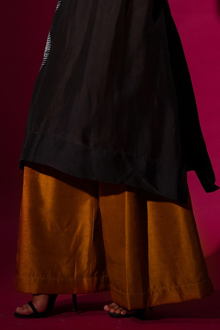 Rust Orange Mysore Silk Pleated Trousers by STOIQUE at Pernia's Pop Up Shop
