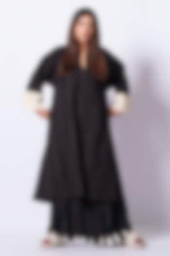 Black Cotton Matty Flared Trousers by STOIQUE at Pernia's Pop Up Shop