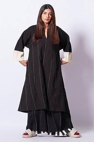Black Cotton Matty Flared Trousers by STOIQUE