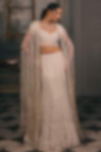 Ivory Beige Shimmer & Net Sequin Hand Embroidered Jacket Bridal Lehenga Set by Studio22 by Pulkita Arora Bajaj at Pernia's Pop Up Shop