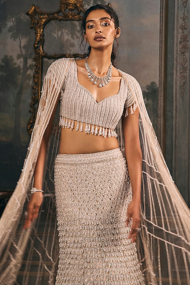 Ivory Beige Shimmer & Net Sequin Hand Embroidered Jacket Bridal Lehenga Set by Studio22 by Pulkita Arora Bajaj at Pernia's Pop Up Shop