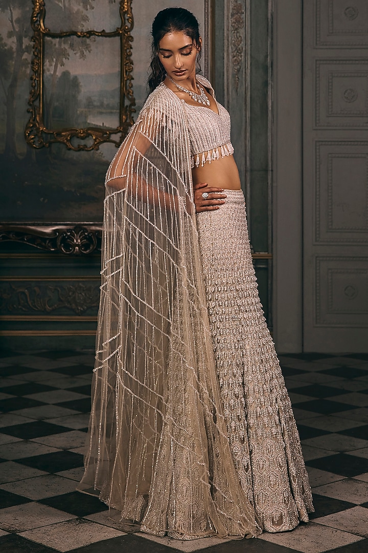 Ivory Beige Shimmer & Net Sequin Hand Embroidered Jacket Bridal Lehenga Set by Studio22 by Pulkita Arora Bajaj at Pernia's Pop Up Shop