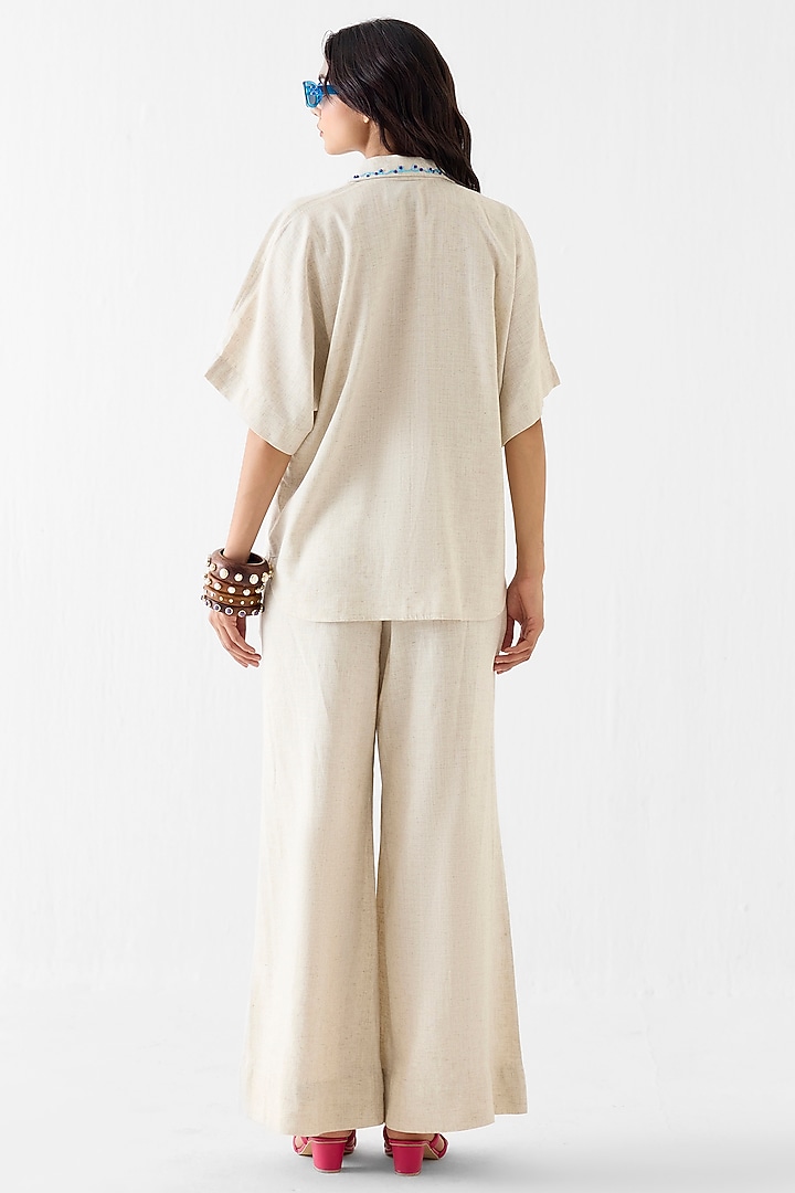 Cream Viscose Linen Hand Embroidered Co-Ord Set by Studio Rigu at Pernia's Pop Up Shop