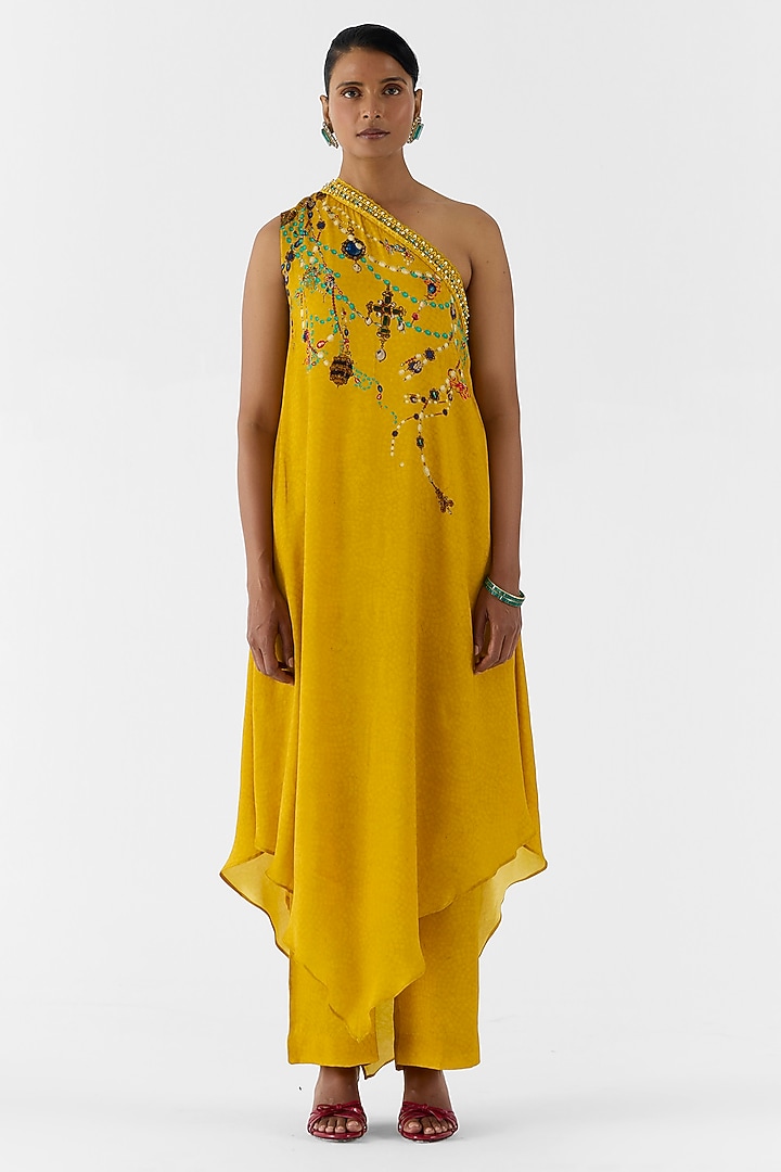 Mustard Vegan Silk Printed & Embroidered One Shoulder Kurta Set by Studio Rigu at Pernia's Pop Up Shop