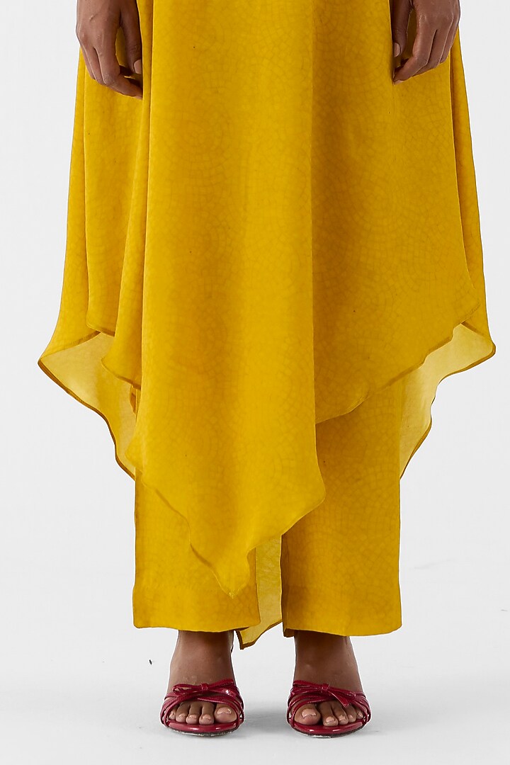Mustard Vegan Silk Printed & Embroidered One Shoulder Kurta Set by Studio Rigu at Pernia's Pop Up Shop