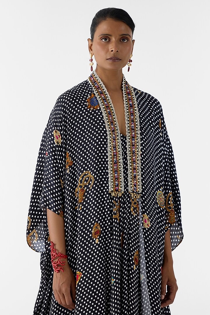 Black Vegan Silk Polka Dot Printed Vacation Dress With Cape by Studio Rigu at Pernia's Pop Up Shop