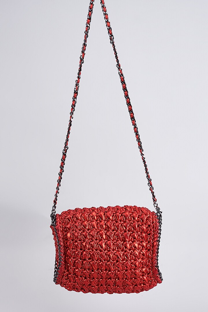 Red Vegan & Recycled Cotton Poly Metallic Yarn Hand Woven Sling Bag by Stushe at Pernia's Pop Up Shop