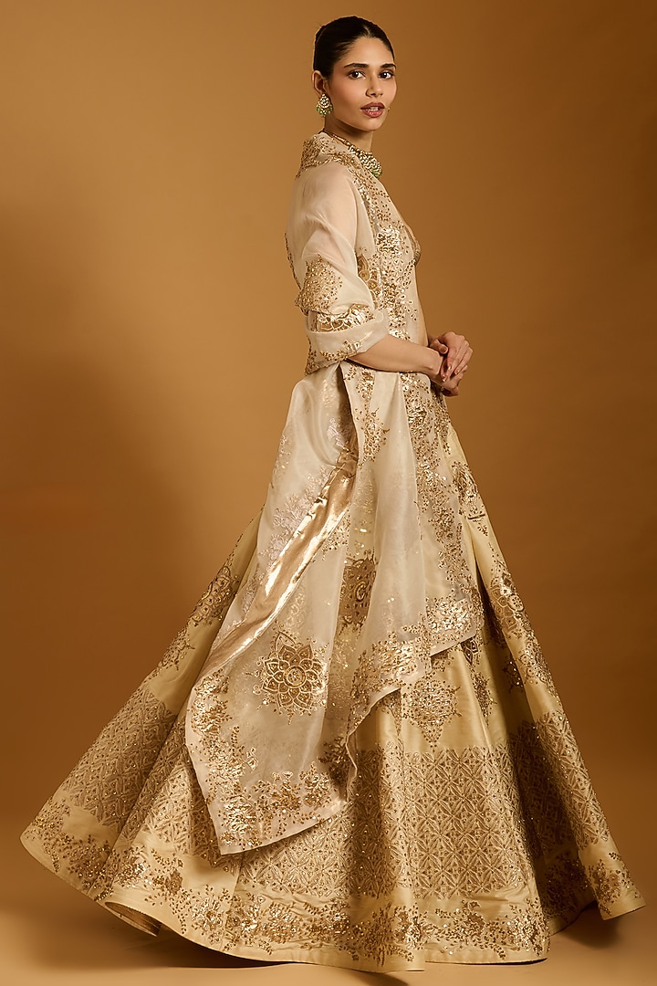 Beige Taffeta Applique Embroidered Bridal Lehenga Set by Siddartha Tytler at Pernia's Pop Up Shop