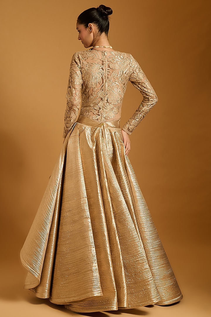 Gold Lamme Quilted Asymmetrical Skirt by Siddartha Tytler at Pernia's Pop Up Shop