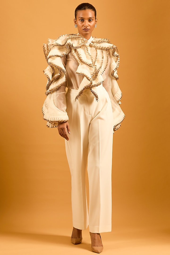 Ivory Knit Flared Pants by Siddartha Tytler at Pernia's Pop Up Shop