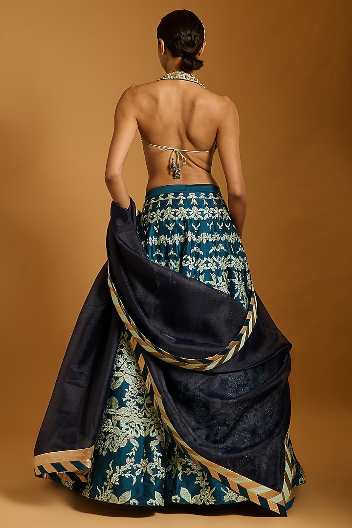 Teal & Aqua Raw Silk Floral Threadwork Bridal Lehenga Set by Siddartha Tytler at Pernia's Pop Up Shop
