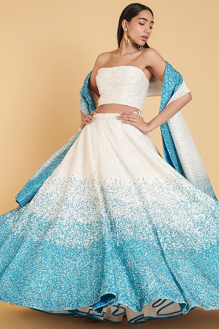 Ivory & Turquoise Embroidered Bridal Lehenga Set by Siddartha Tytler at Pernia's Pop Up Shop