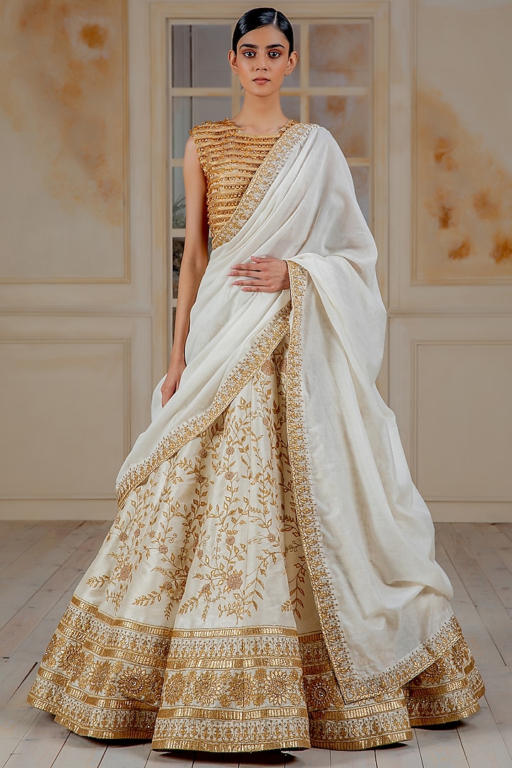 Ivory & Golden Floral Embroidered Kalidar Lehenga Set by Siddartha Tytler
