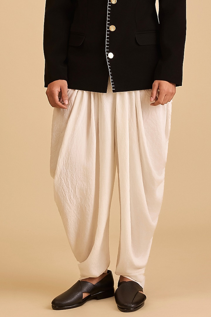 Ivory French Rayon Draped Pants by Siddartha Tytler Men at Pernia's Pop Up Shop