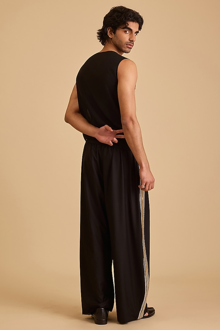 Black Micro Fiber Oversized Pants by Siddartha Tytler Men at Pernia's Pop Up Shop