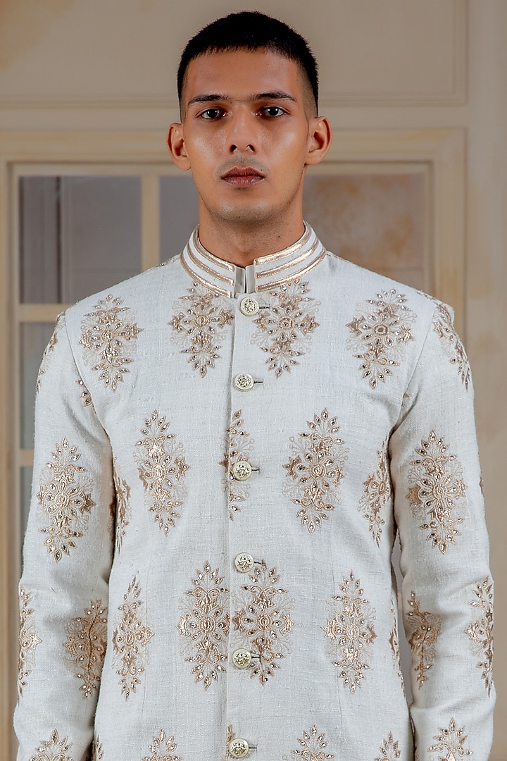 Ivory Matka Silk Applique Work Groom Sherwani Set by Siddartha Tytler Men at Pernia's Pop Up Shop