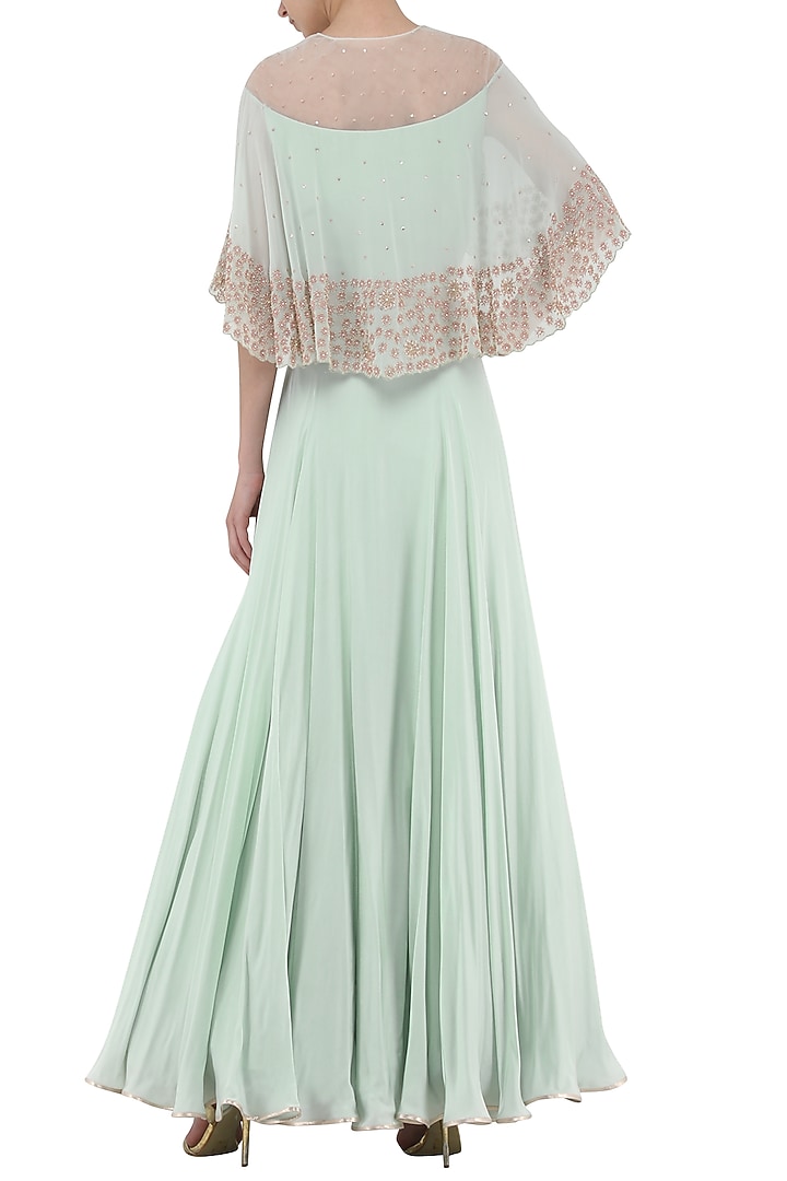 Pistachio green embroidered crop top with attached cape and skirt set available only at Pernia's Pop Up Shop.