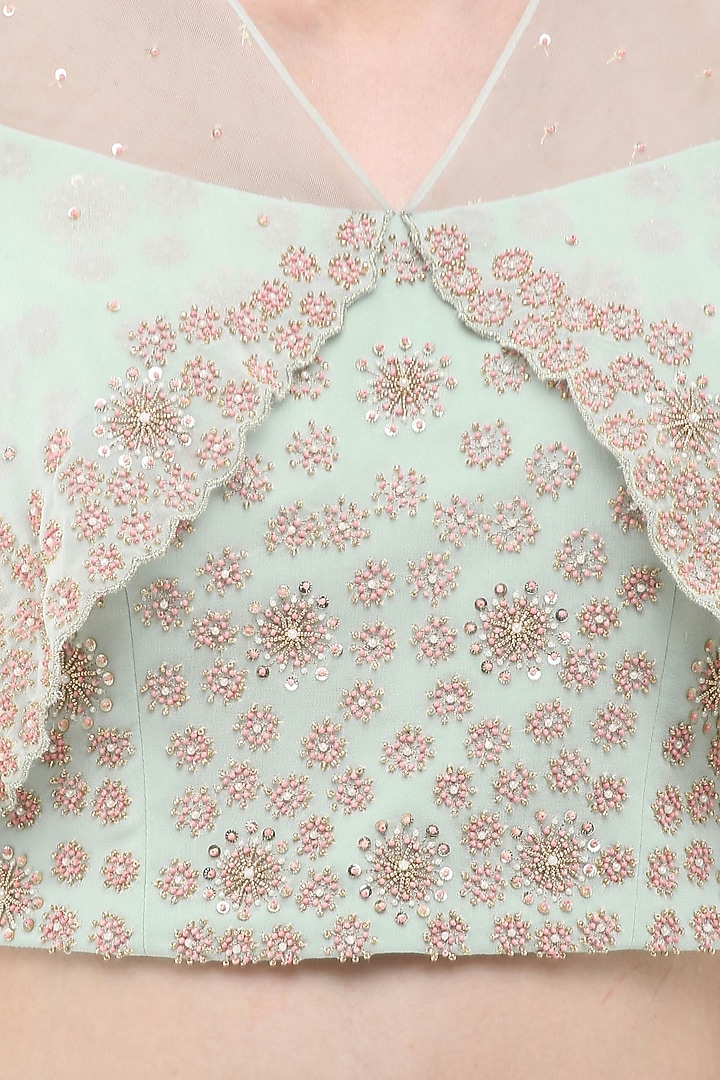 Pistachio green embroidered crop top with attached cape and skirt set available only at Pernia's Pop Up Shop.