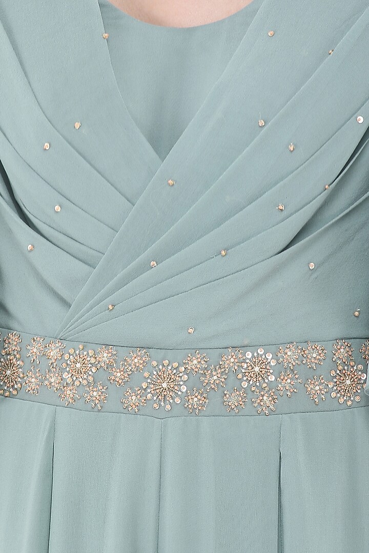 Pebble green embroidered draped jumpsuit available only at Pernia's Pop Up Shop.