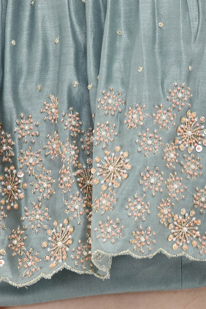 Pebble green embroidered off shoulder crop top with skirt set available only at Pernia's Pop Up Shop.